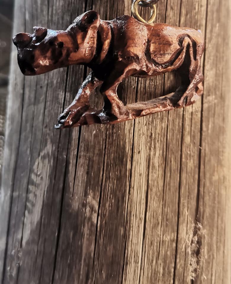 Awesome hand carved animal key chains 1 155434233 2752477978395523 376961555854287896 n